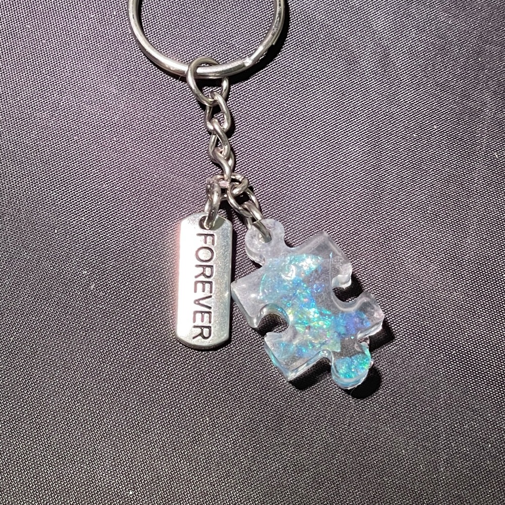 Handmade puzzle piece keychain.